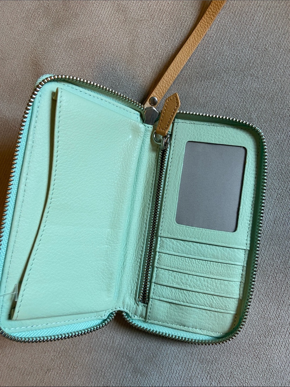Roots Mint Green Leather Zip Wallet with Tan Wrist Strap